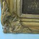 Old signed landscape painting under wood.