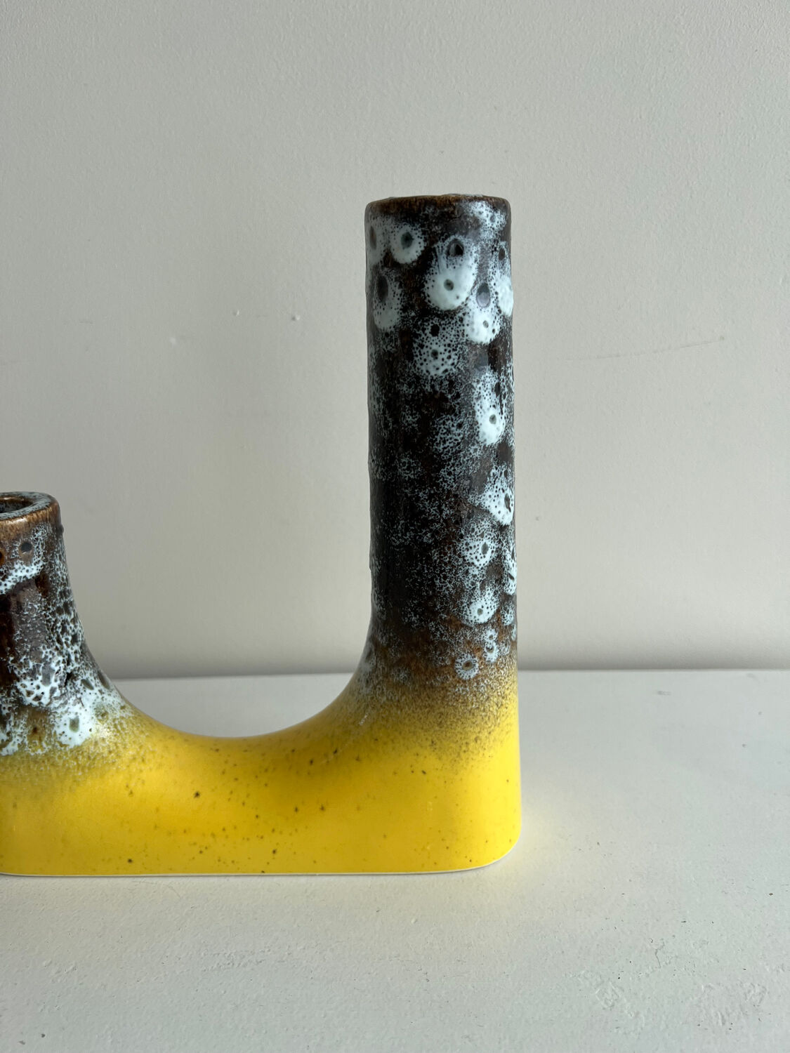 Double asymmetrical candle holder