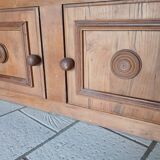 Low oak furniture in the Dudouyt style, with a sculpted front.