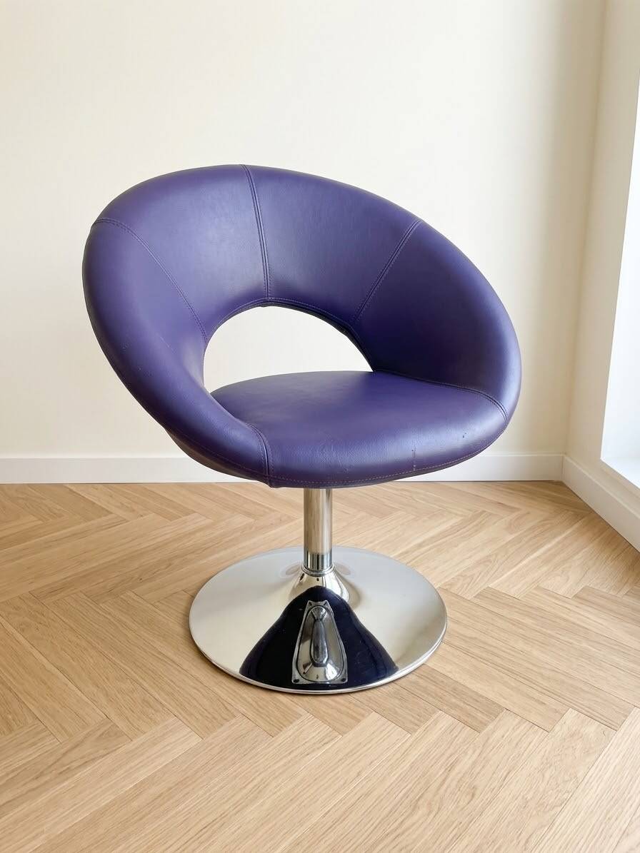 Vintage 70s armchair in purple faux leather with steel legs.