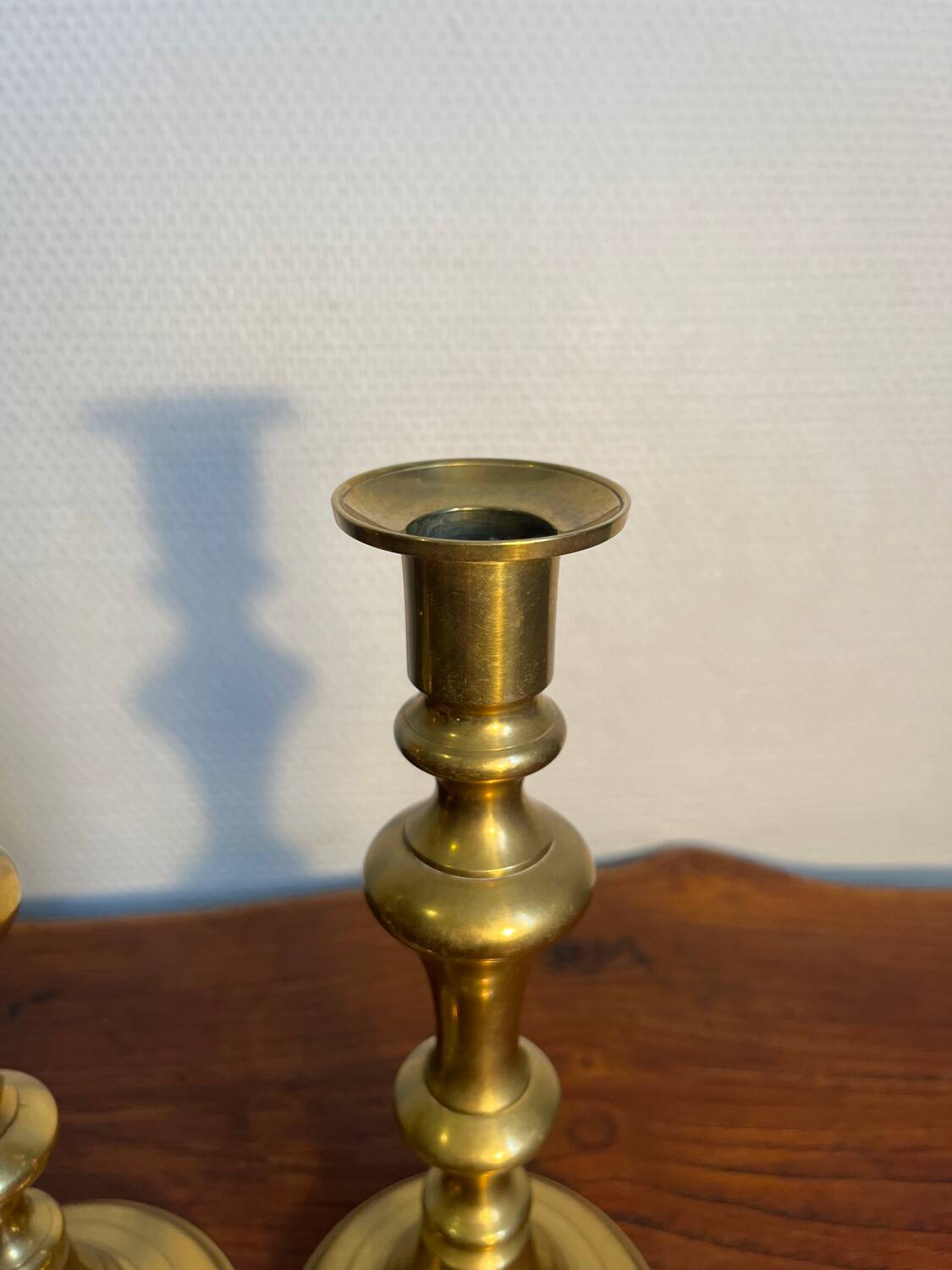 Pair of duo of ringed brass candlesticks