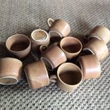 Series of 11 sandstone cups