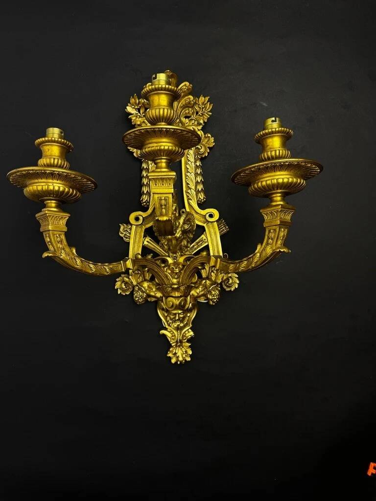 A pair of important gilt bronze wall sconces, Louis XVI style, 19th century.