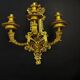 A pair of important gilt bronze wall sconces, Louis XVI style, 19th century.