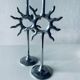 Pair of sun candle holders