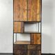 Antique wooden cabinet with black metal structure