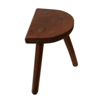 Old wooden tripod stool