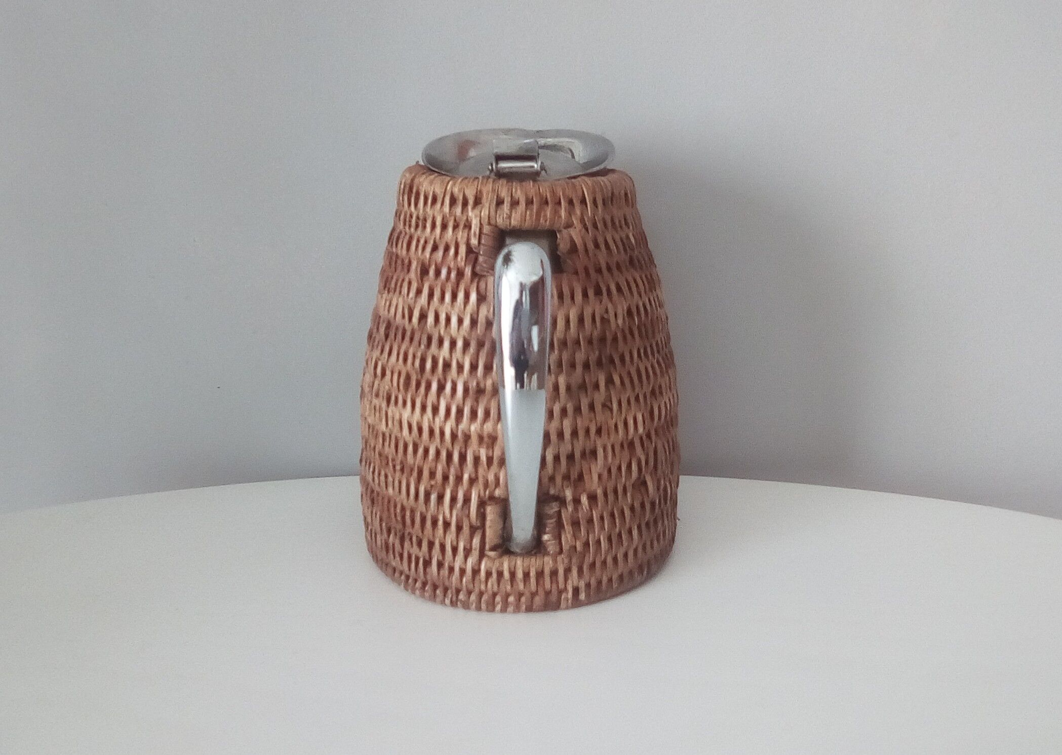 1980s rattan stainless steel pitcher