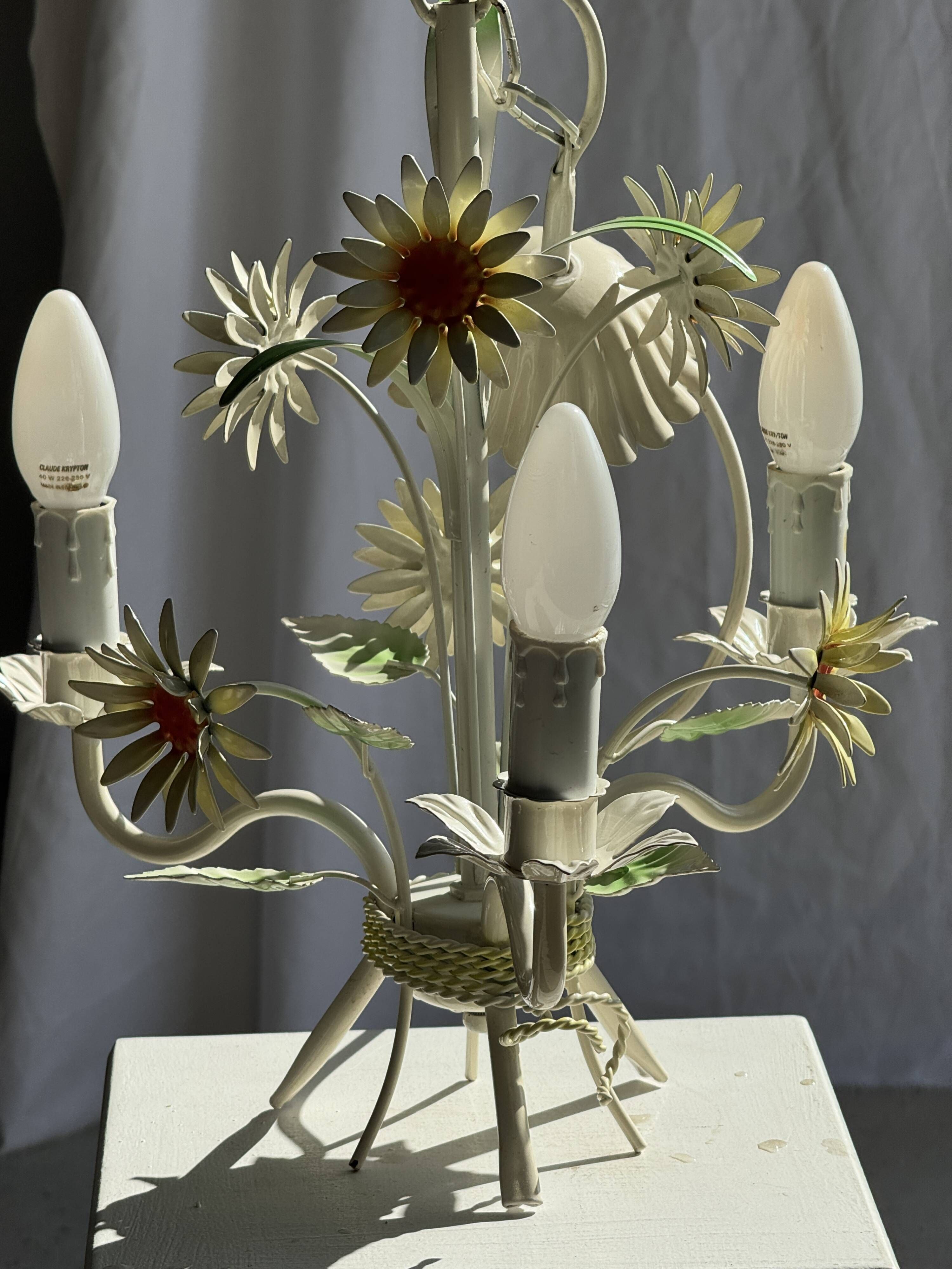 Small vintage cream metal flower chandelier with orange flowers and 3 arms.