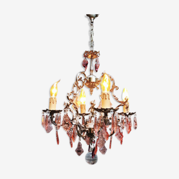 Old baroque cage chandelier with grapevines