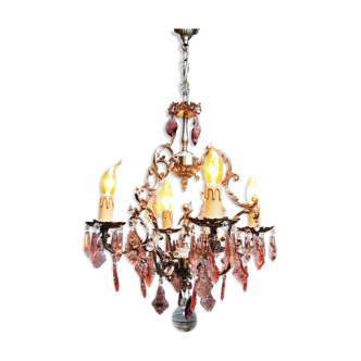 Old baroque cage chandelier with grapevines