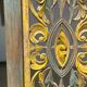 Rectangular Indonesian construction element with blue and yellow plant in carved wood