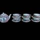 Canton porcelain tea service with 6 cups and teapot.