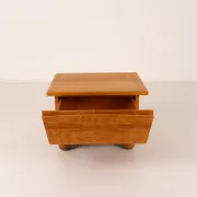 Pair of wooden bedside tables with rounded feet