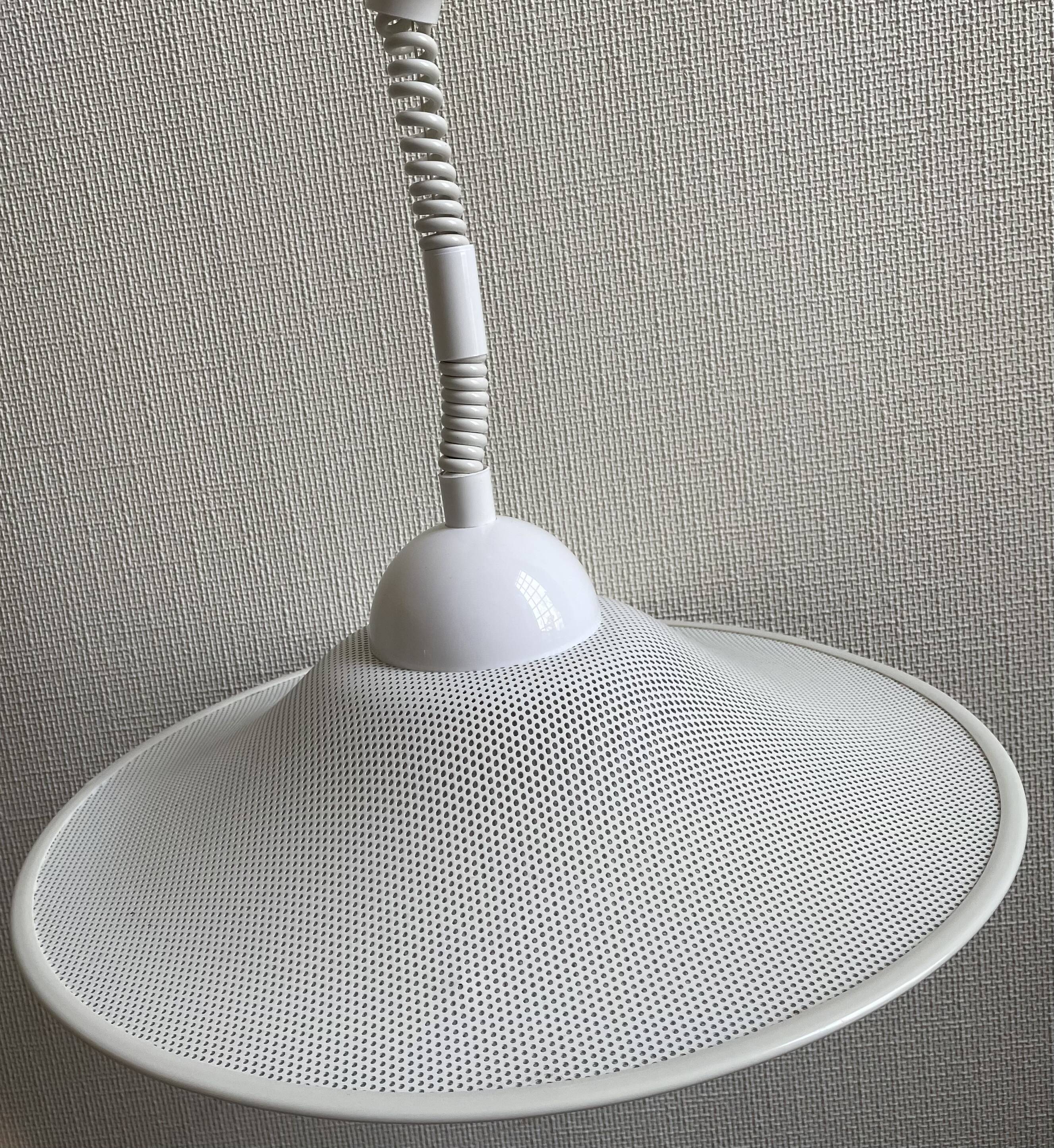 Suspension of the 80s in perforated white metal