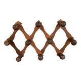 Extendable wooden coat rack with 10 old vintage hooks
