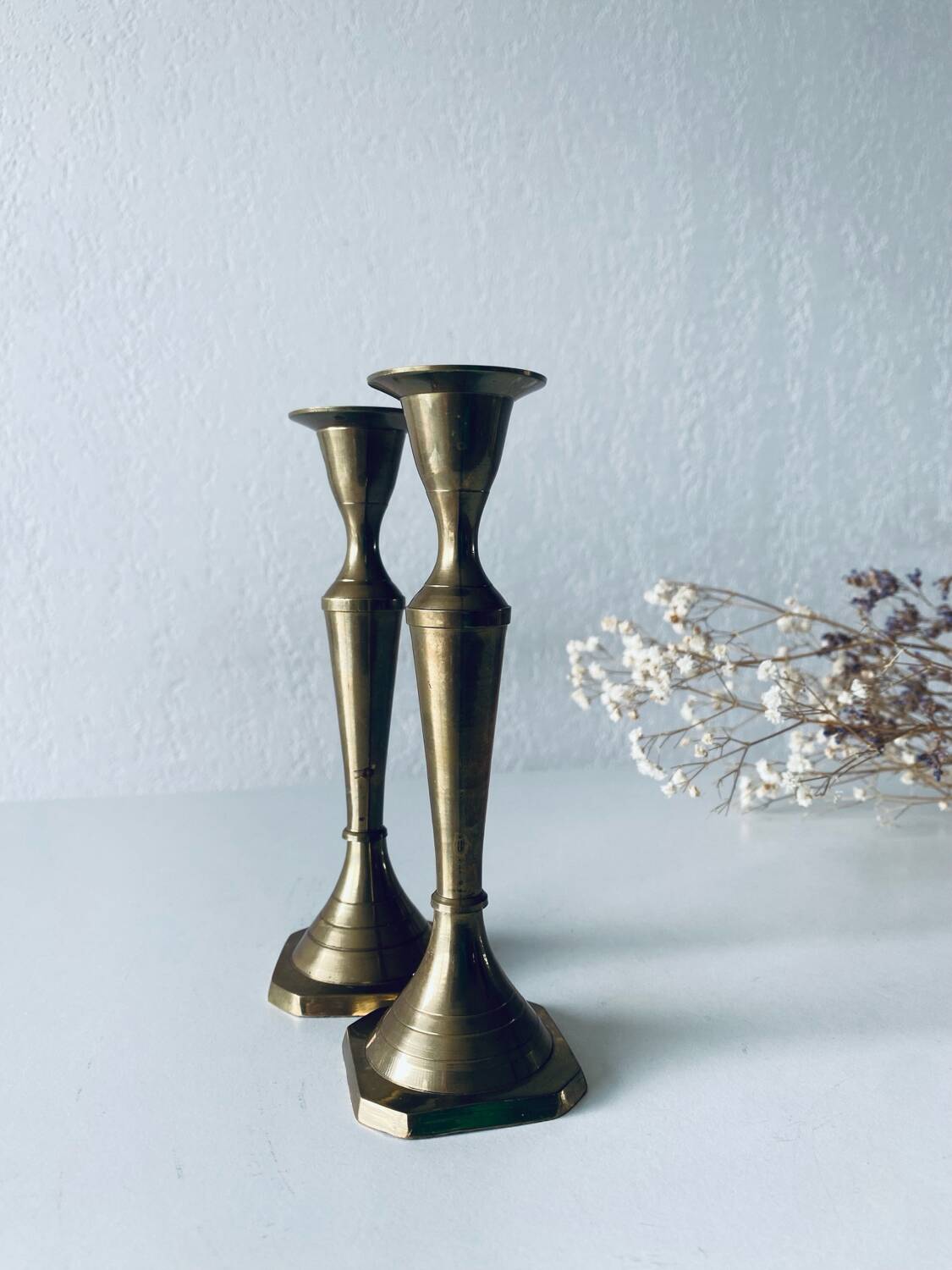 Pair of Indian brass candlesticks