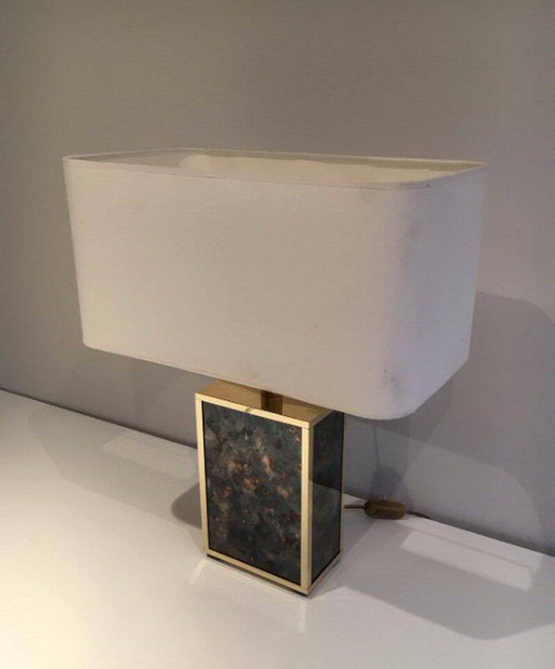 Lamp in gilded metal and stylized glass. In the style of Aldo Tura