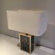 Lamp in gilded metal and stylized glass. In the style of Aldo Tura