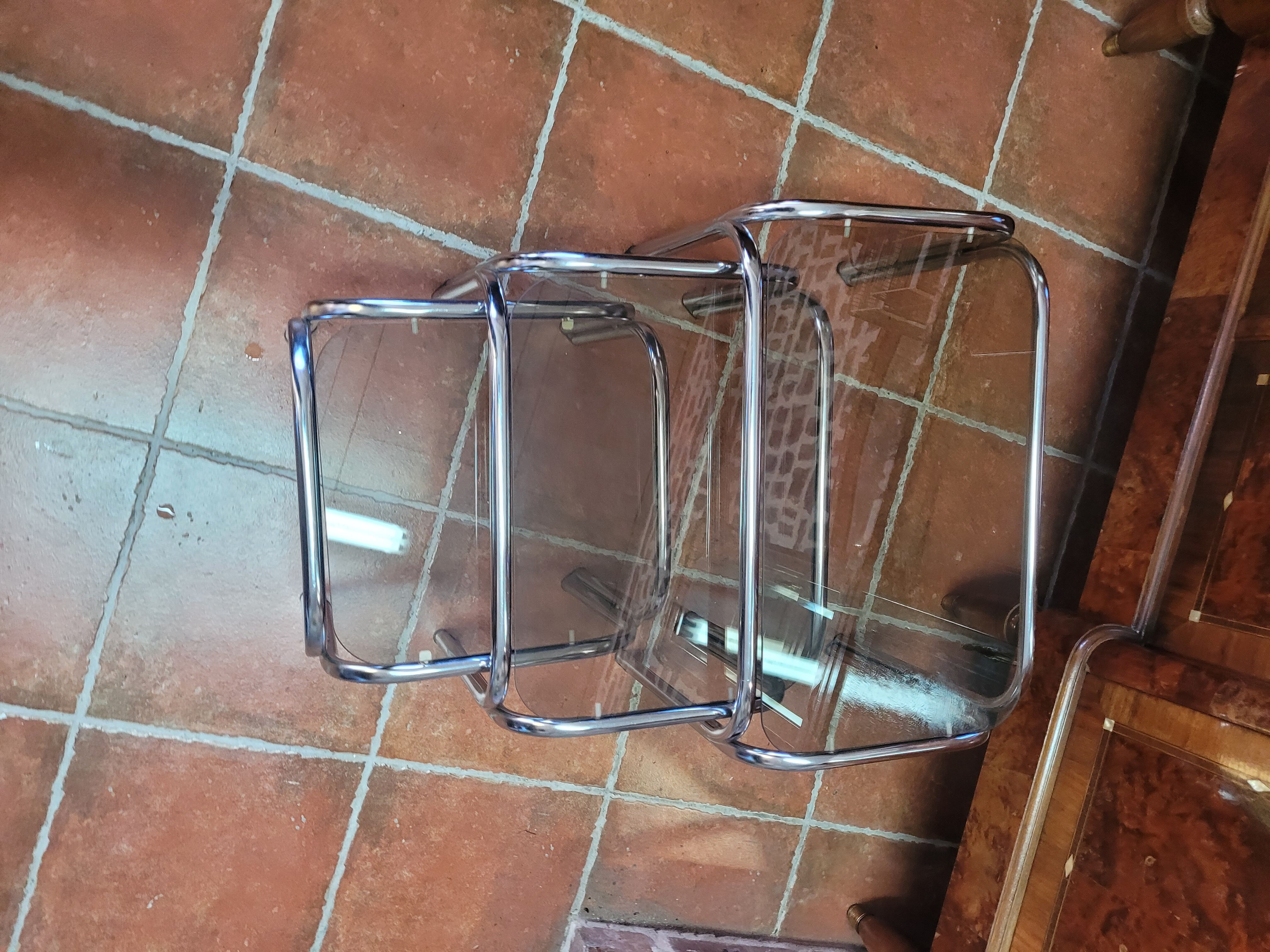 Chrome nesting table with smoked glass top from the 70s