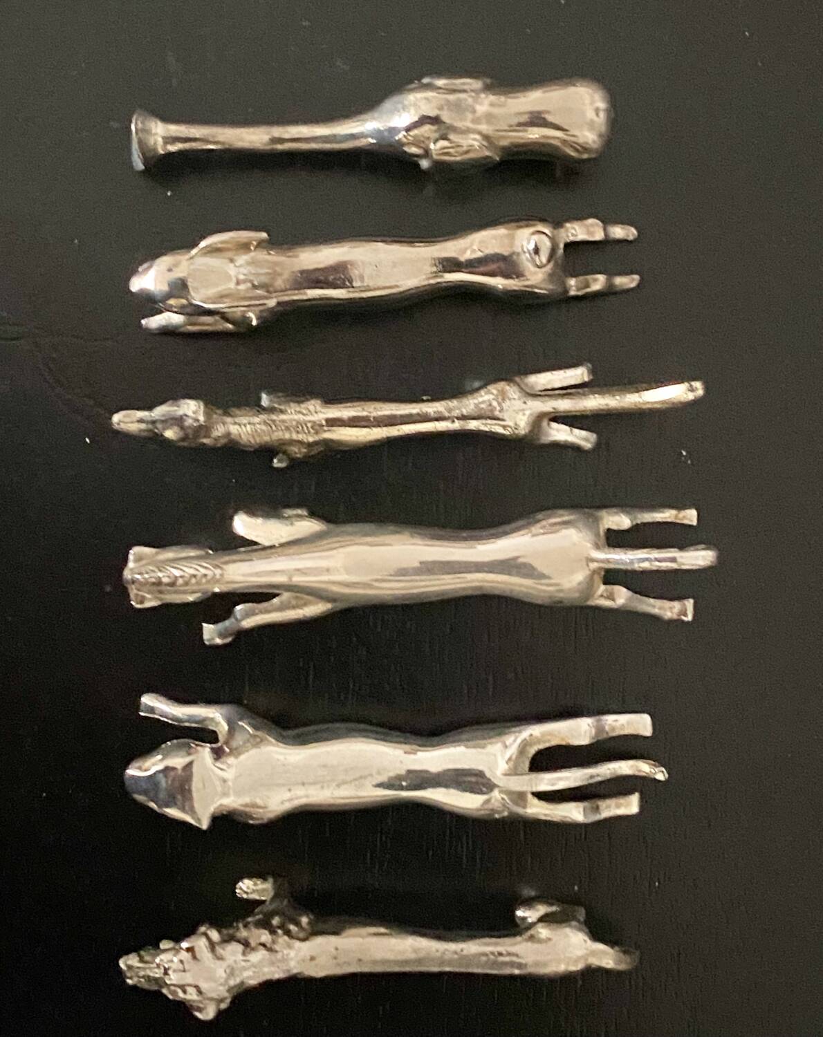 6 various animal shaped knife holders in silver metal