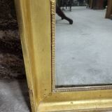 Large gilt mirror in 2 parts from the early 19th century