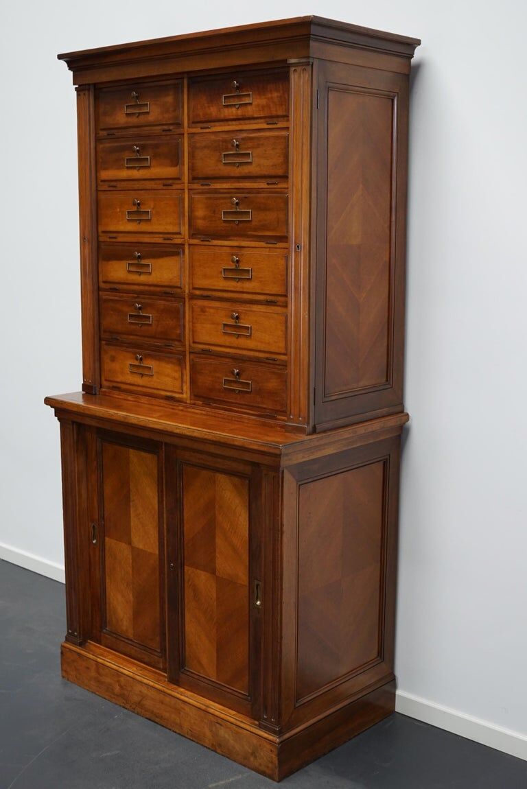Walnut apothecary furniture France 1920s