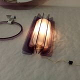 Set of plexiglass wall lights and mirror by Harvey Guzzini, 1970s