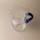 Vintage glass pitcher - clear glass with blue handle - Mid-Century design from Italy in the 1970s - elegant table decoration, retro gift idea.