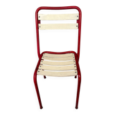 Red and white Tolix chair