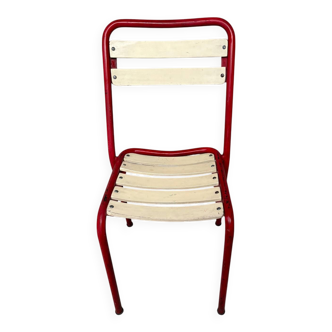 Red and white Tolix chair