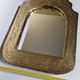 Oriental mirror in wood and hammered brass in the shape of an arch, plant decor, 52 cm