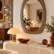 Vintage mirror with smoked glass frame from the 1970s.