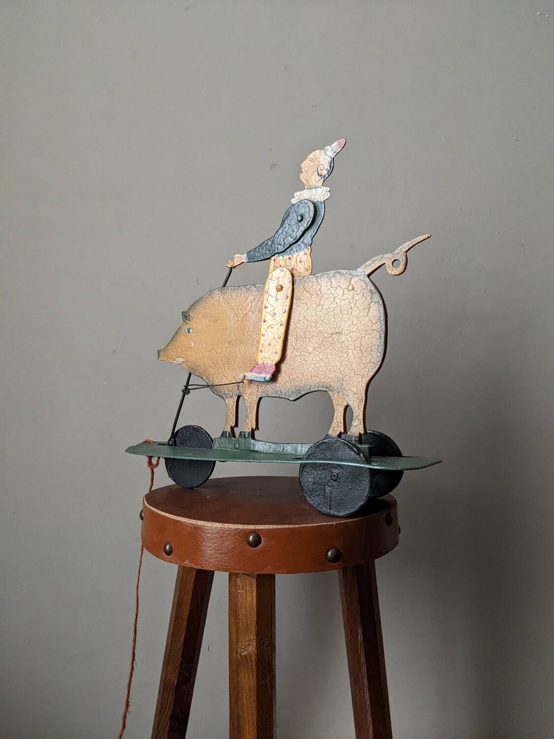 Antique pull toy, metal, hand-painted decoration, clown circus