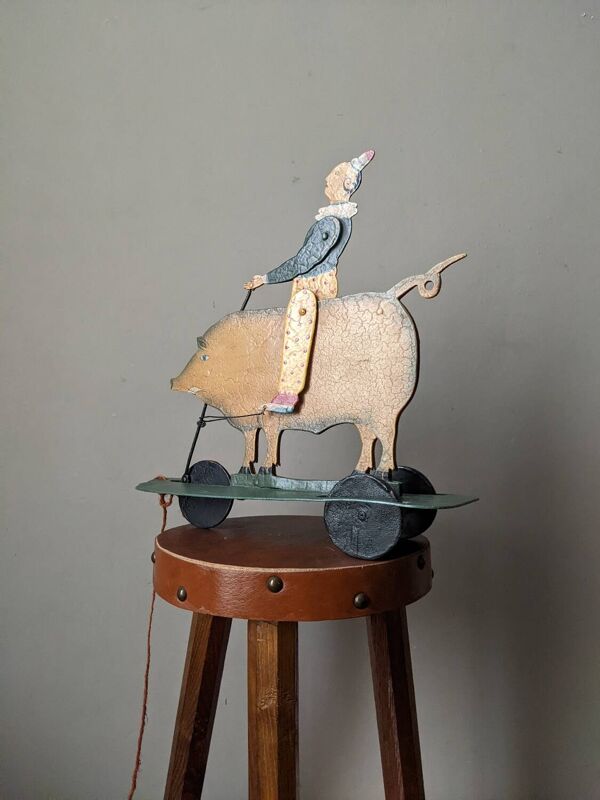 Jouet ancien à tirer métal décor peint à la main clown cirque