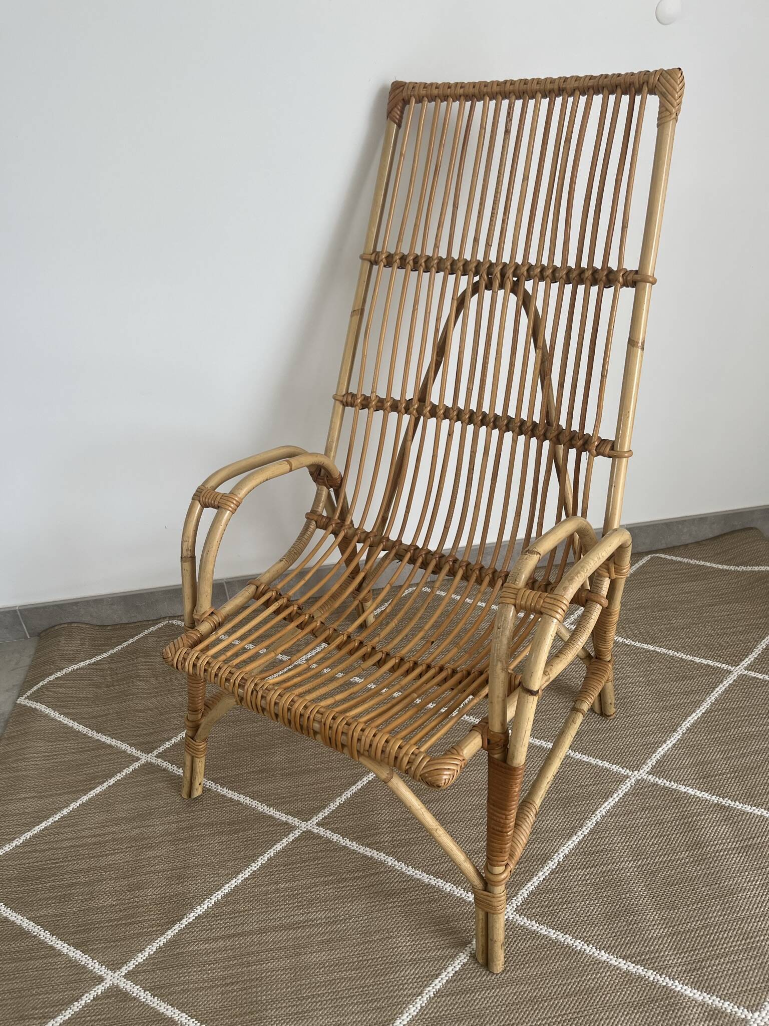 Large rattan armchair