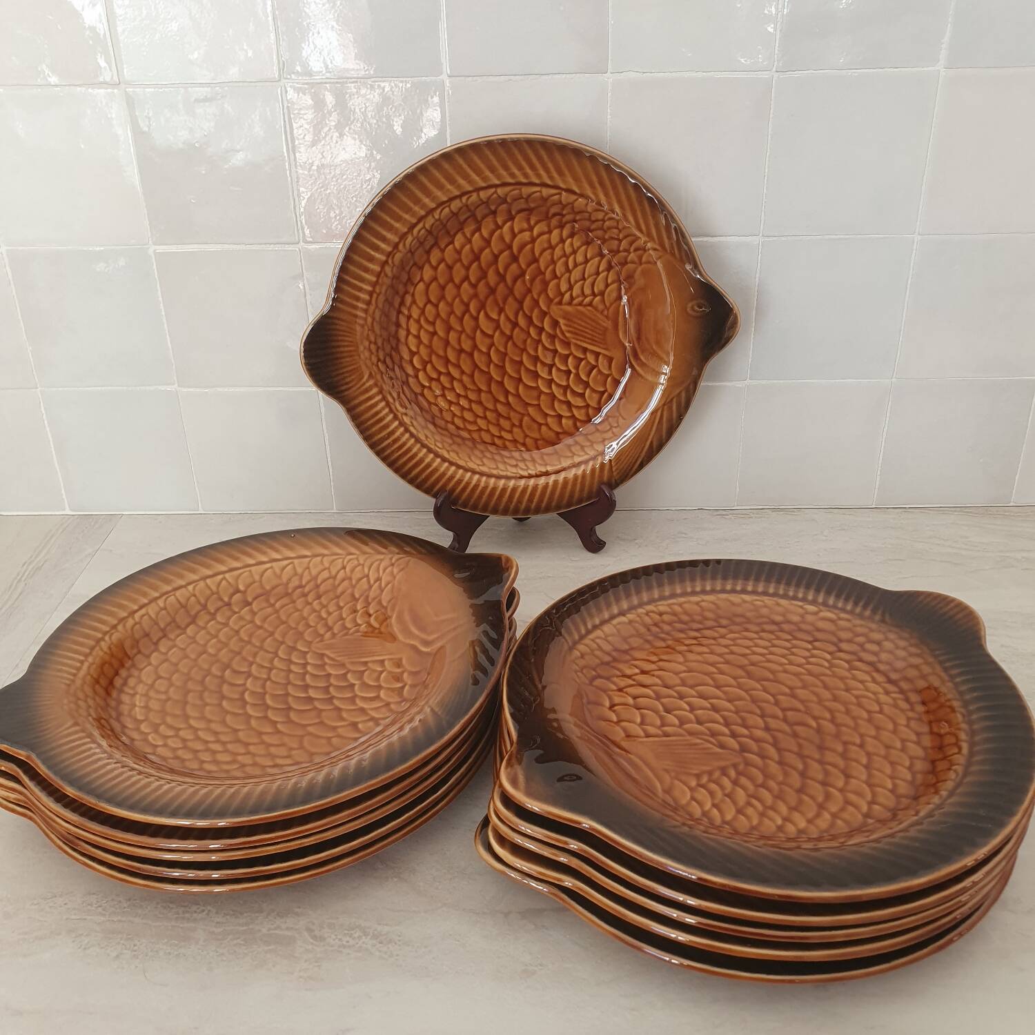 Sarreguemines / 11 earthenware fish-shaped plates