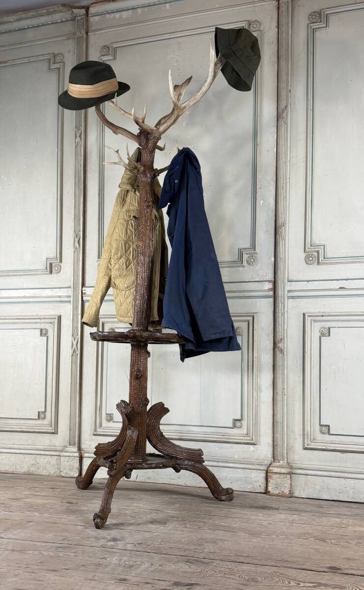 Carved wooden coat rack from the Black Forest, circa 1900.