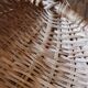 Light wicker oval basket with vintage round handle