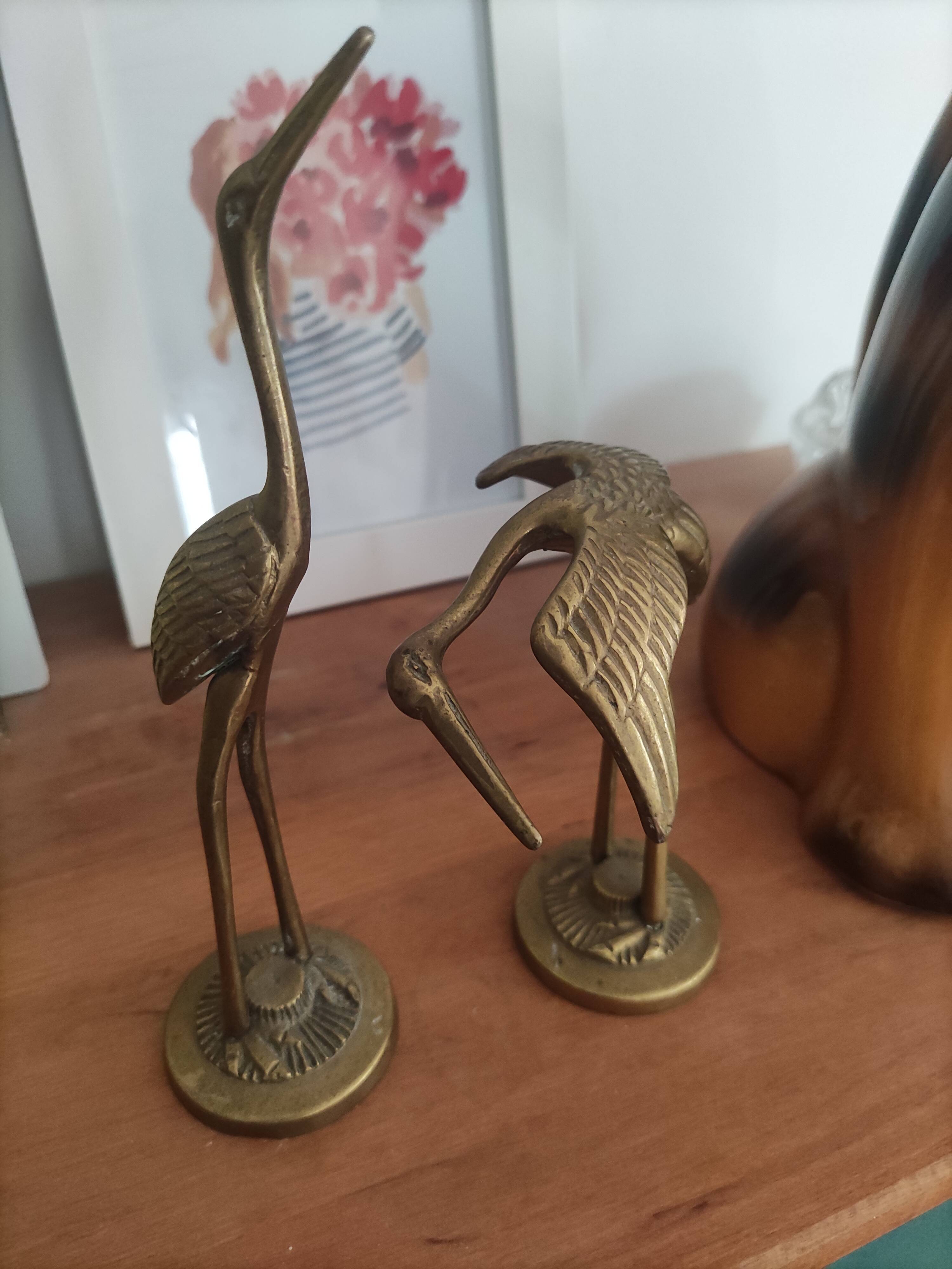 Brass heron duo