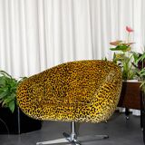 Vintage swivel shell armchair
