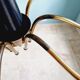 Spider chandelier in brass and black lacquered metal Italian design 1950s