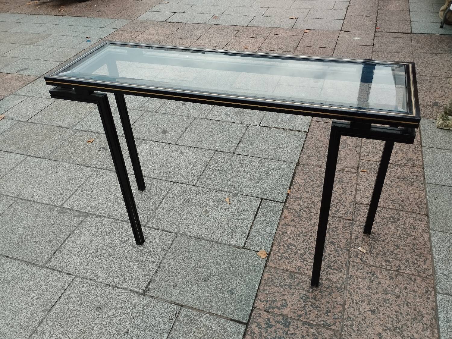 Old console with vintage glass top