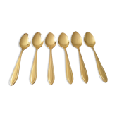 Golden metal teaspoons