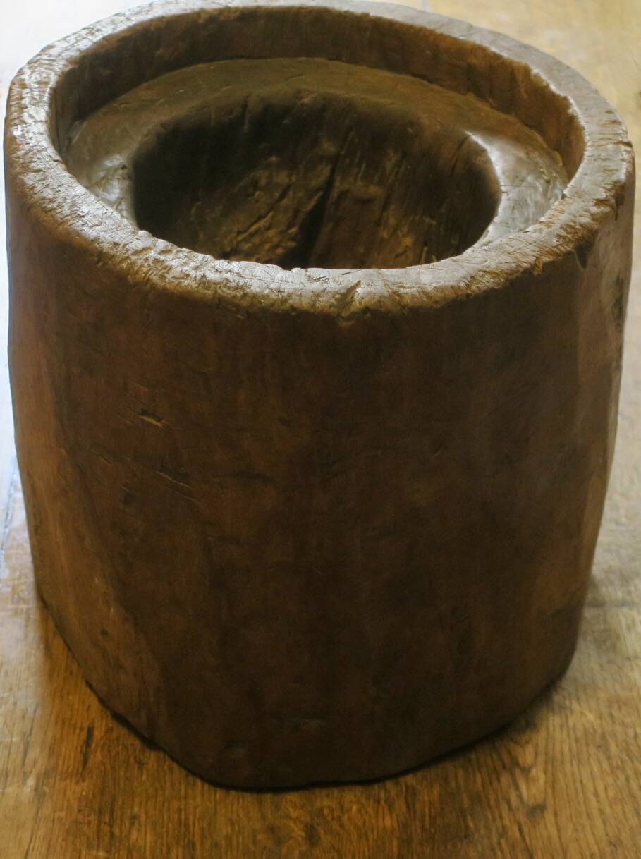 Carved antique tree stump coffee table with circular glass top