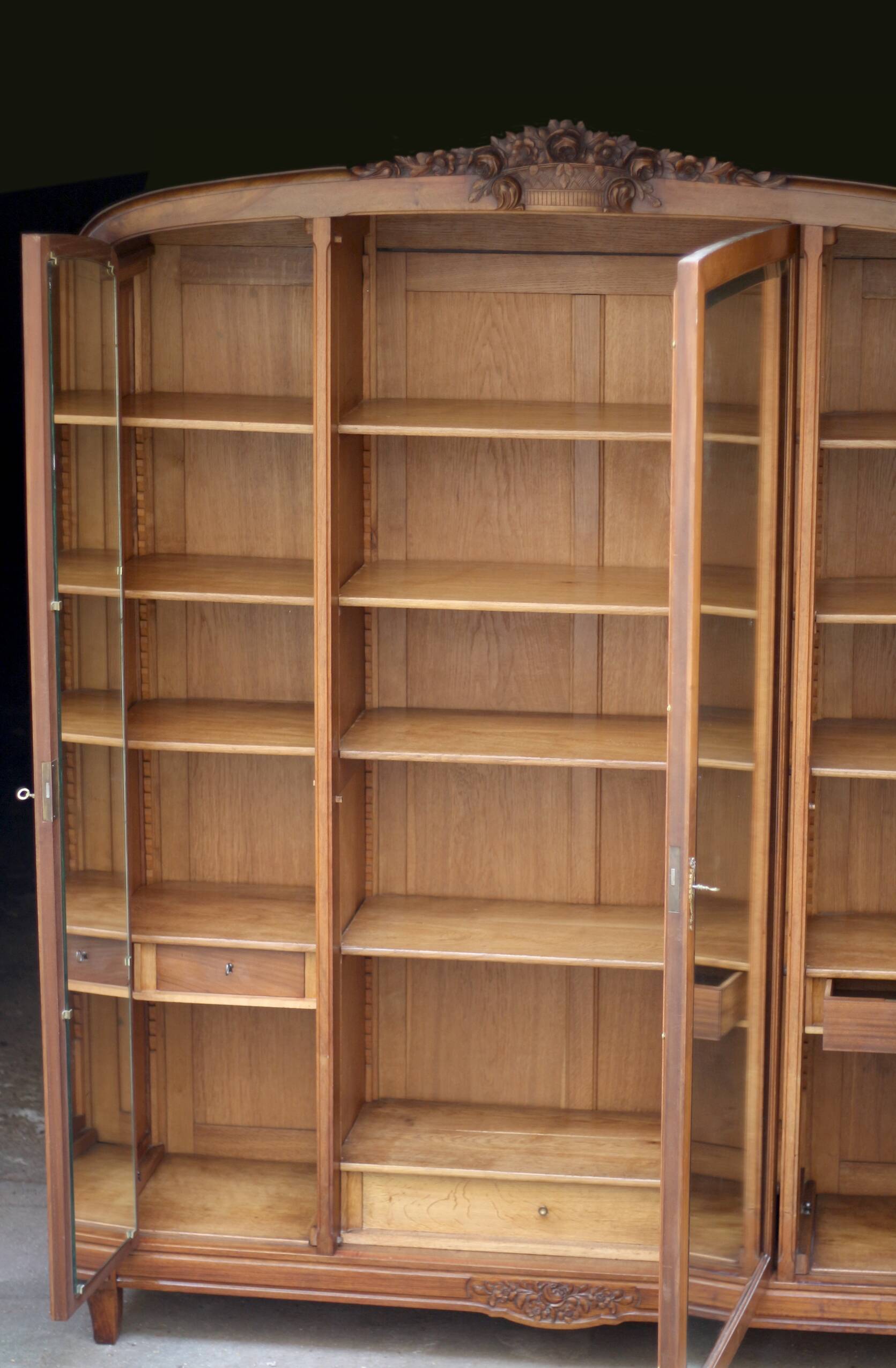 Majestic solid walnut wardrobe. Stamped work, late 19th century.
