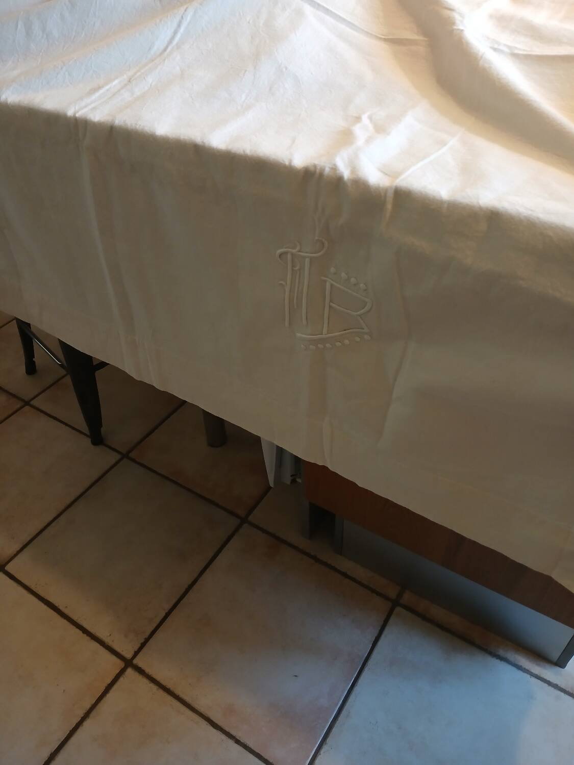 Antique sheet with embroidered initials