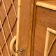 Rattan wardrobe with tapered legs from the 1960s.