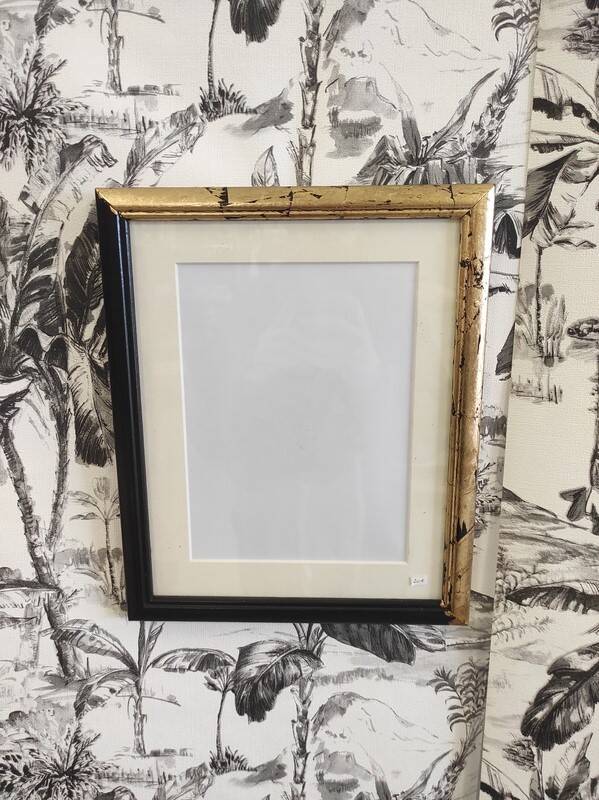 Black frame and gold leaf