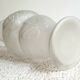 Art deco vase with floral pattern in molded pressed glass vintage 1930s